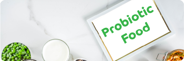 A whiteboard with the words 'probiotic food' written on it in green