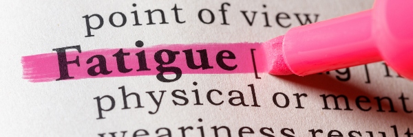 The word 'fatigue' in a dictionary being highlighted in pink for emphasis.