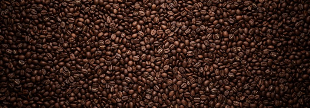 Close up view of brown coffee beans.