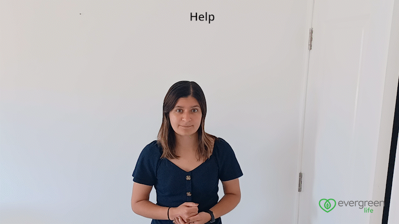 A GIF of Evergreen Life Content Writer Jayna Shepherd signing the words 'Can I help you?' in British Sign Language. The Evergreen Life logo can be found in the bottom right hand corner.